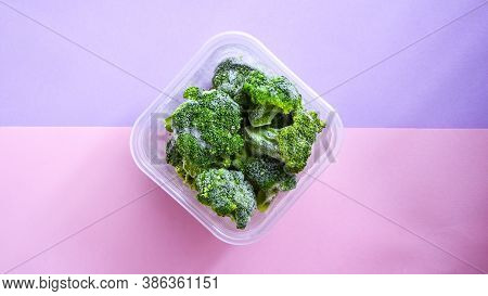 Broccoli In A Plastic Container For Long-term Storage. Deep Freezing Of Vegetables. Frozen Food Vege