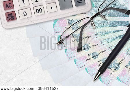 100 Czech Korun Bills Fan And Calculator With Glasses And Pen. Business Loan Or Tax Payment Season C