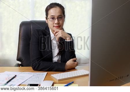 Business Women Smileing Wear Glasses Sitting At Office. Business People Using Computer Pc  At Office