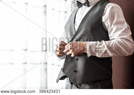 Grooms Morning Preparation, Handsome Groom Getting Dressed And Preparing For The Wedding, White Shir