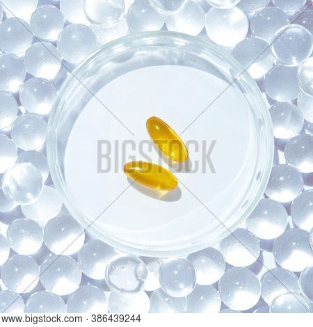 Omega3 Gel Capsules. Yellow Vitamin. Dietology Drug. Fish Oil Supplement. Microdosing Concept. Golde