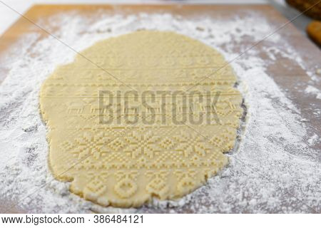 Dough Rolled Out On The Table With A New Year's Pattern. Making Cookies On The New Year's Table, A F