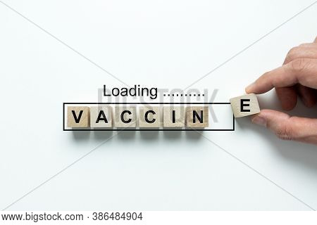 Hand Loading Letter E Of Vaccine For Covid 19 Vaccine Readiness Concept