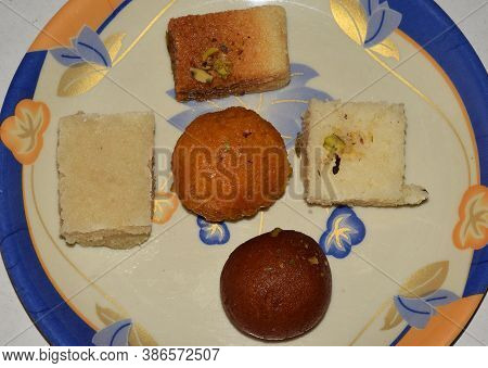 Various Kinds Of Indian Sweet Dish On A Platter
