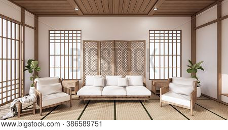 Sofa And Partition Japanese On Room Tropical Interior With Tatami Mat Floor And White Wall.3D Render