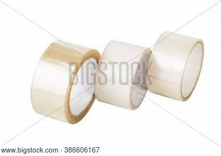 Transparent Adhesive Tape On A White Background. One Lighter Second Yellow. Close-up. Isolate