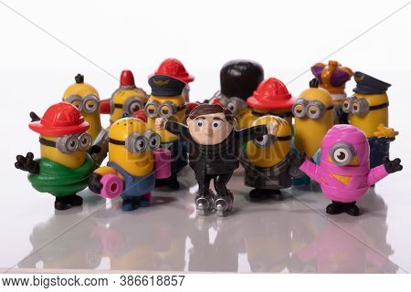 Los Angeles, Usa - August 17, 2020: Minions And Young Felonius Gru Toys Isolated On White Background