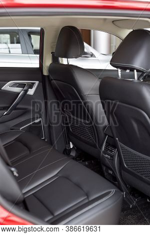 Russia, Izhevsk - August 14, 2020: Geely Showroom. Back Passenger Seats And Black Leather Driver Sea