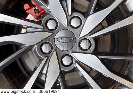Russia, Izhevsk - August 14, 2020: Geely Showroom. The Alloy Wheel Of A New Coolray Car. Cropped Ima