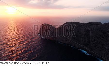 Lantern Cap De Formentor, Pink Colored Sunrise Over Lighthouse At Cape Formentor In Coast Of North M