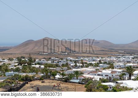 Lanzarote / Spain - 21 May 2016: View Of The Town Of Nazaret And Volcanic Mountains On The Island Of