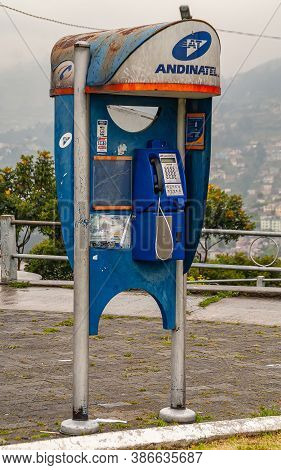 Quito, Ecuador - December 2, 2008: Frontal Closeup Of Blue Andinatel Public Telphone Booth. Bakdrop 