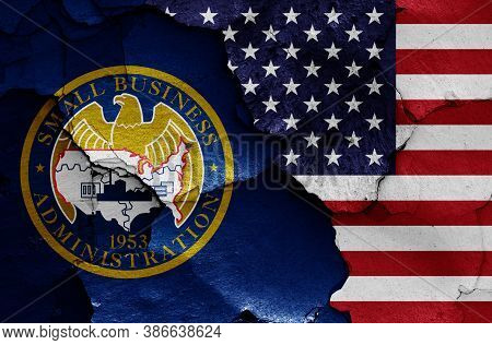 Flags Of  U.s. Small Business Administration And Usa Painted On Cracked Wall