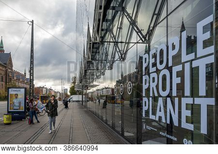Copenhagen, Denmark - Oct 18, 2018: Street View Of Pedestrians Walking Between The Modern Industrien