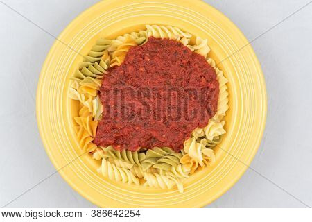 Overhead View Of Healthy Serving Of Rotelli With Marinara Sauce In A Bowl To Complete A Delicious Me