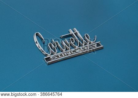 Toronto, Canada - 08 18 2018: Chevrolet Corvette Sting Ray Emblem On The Trunk Of Blue Oldtimer Car 