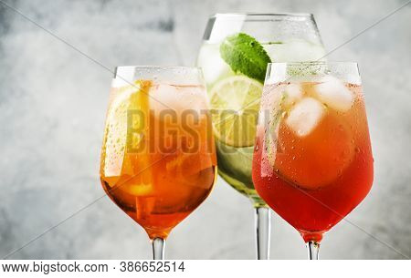 Set Of Summer Italian Alcoholic Cocktails, Aperol Spritz, Martini Royale, Campari Tonic With Bitters