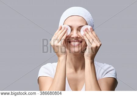 Cosmetology Face Cleaning. Female Beautiful Portrait. White Cotton Pad. Home Facial Routine. Remove 