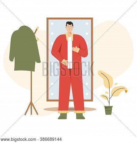 Man Gets Dressed In Front Of Full Length Mirror