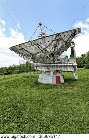 Big Silver Radiotelescope Antenna From The Side