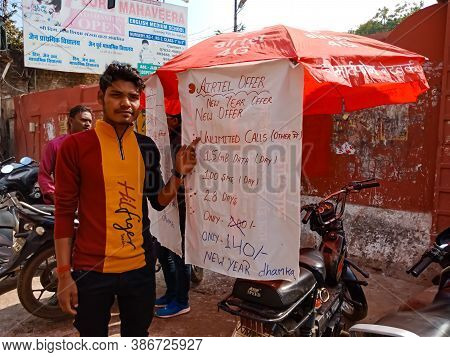 District Katni, India - January 12, 2020: Indian Mobile Network Airtel Distributor Presenting Tariff