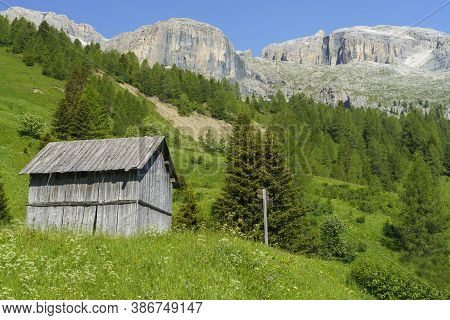 Mountain Landscape At Summer Along The Road To Campolongo Pass, Dolomites, Belluno Province, Veneto,