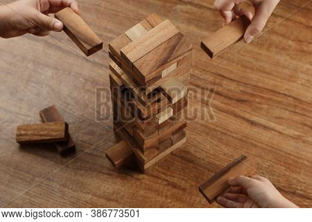Strategy In Business And Alternative Risk Plan, Young Intelligen Building Up Tower. Hand, Interferen