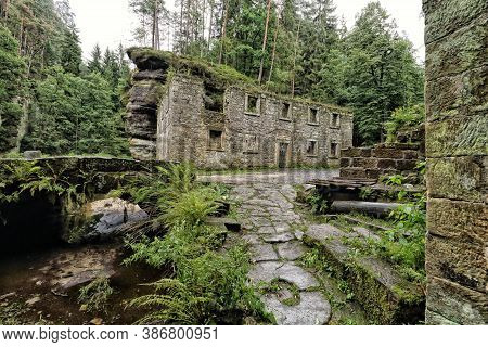 House Of The Broken Mill By The Small Foot Bridge In The Middle Of Fern