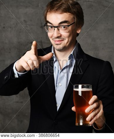 Portrait Of Middle-aged Man In Stylish Official Clothing Jacket And Shirt Holding A Glass Of Drink C