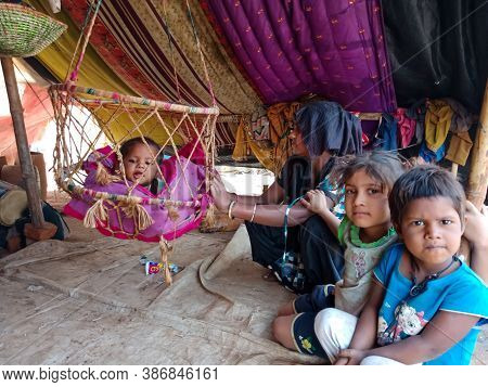 District Katni, India - January 29, 2020: An Asian Village Poor Mother Caring His New Born Child In 