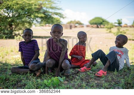Engare Sero. Tanzania - January 2020: Indigenous Maasai In Traditional Village. Maasailand Is The Ar