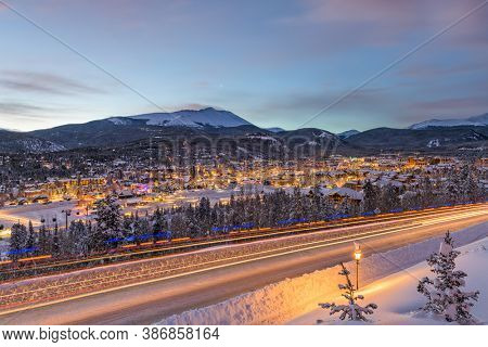 Breckenridge, Colorado, USA town skyline in winter at dusk.