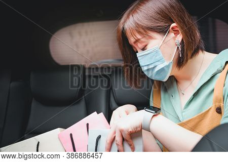 New Normal And Social Distancing Concept With Asian Woman Wear Protective Mask And See Shopping Bag 