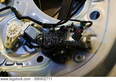 The Inner Lining Has Been Removed From The Door Of A Modern Car. You Can See The Wiring And The Powe