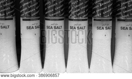 Black And White Photo Of Sea Salt, Pepper, Spices, Herbs, Coriander Etc Put In Shelves For Sale. She
