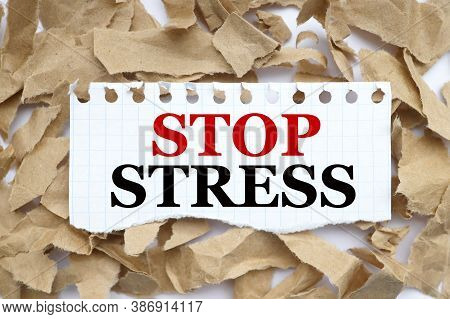 Stop Stres. Text On White Paper On Torn Paper