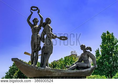 Dnipro, Ukraine - July 21, 2020: Youth Of The Dnipro Sculpture On Sicheslavska Embankment. Three Bro