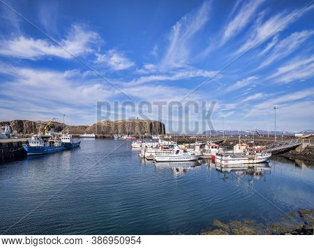 16 April 2018: Stykkisholmur, Iceland - Boats Moored In The Harbour At Stykkisholmur, On The Snaefel