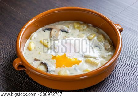 dill soup with poached egg