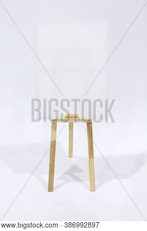 Canvas Frame Blank For Mockup On Wooden Easel. Creative For Paint Drawing Of Artist Concept. With Cl