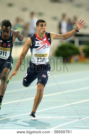 Barcellona - 11 luglio: Adam Gemili della Gran Bretagna durante l'evento di 100 metri la XX World Junior 