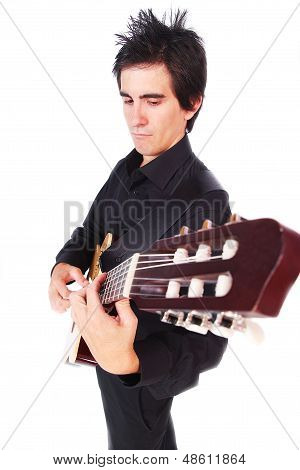 A Male Guitarrist In Action