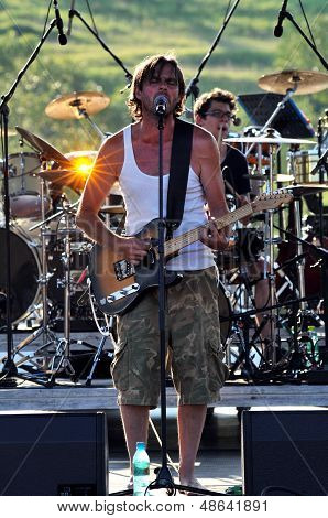 Rock band performs live on the stage