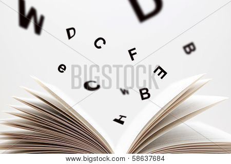 Spell book with flying numbers and open pages