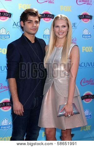 Garrett Clayton and Claudia Lee at the 2013 Teen Choice Awards Arrivals, Gibson Amphitheatre, Universal City, CA 08-11-13