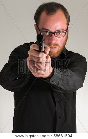 Man Holding a Pistol Gun