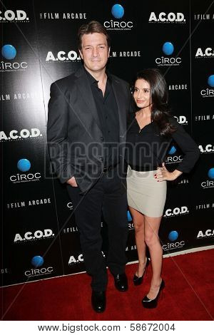 Nathan Fillion and Mikaela Hoover at the 