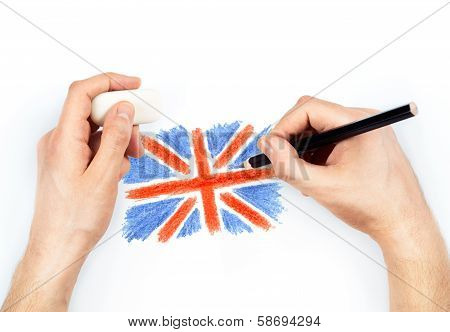 Man's Hands With Pencil Draws Flag Of United Kingdom Of Great Britan On White