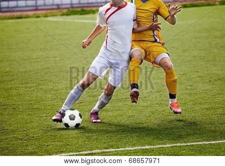Soccer player legs in action 