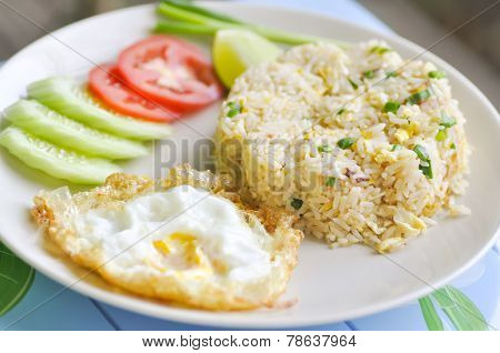 Fried Rice And Fried Egg With Vegetable